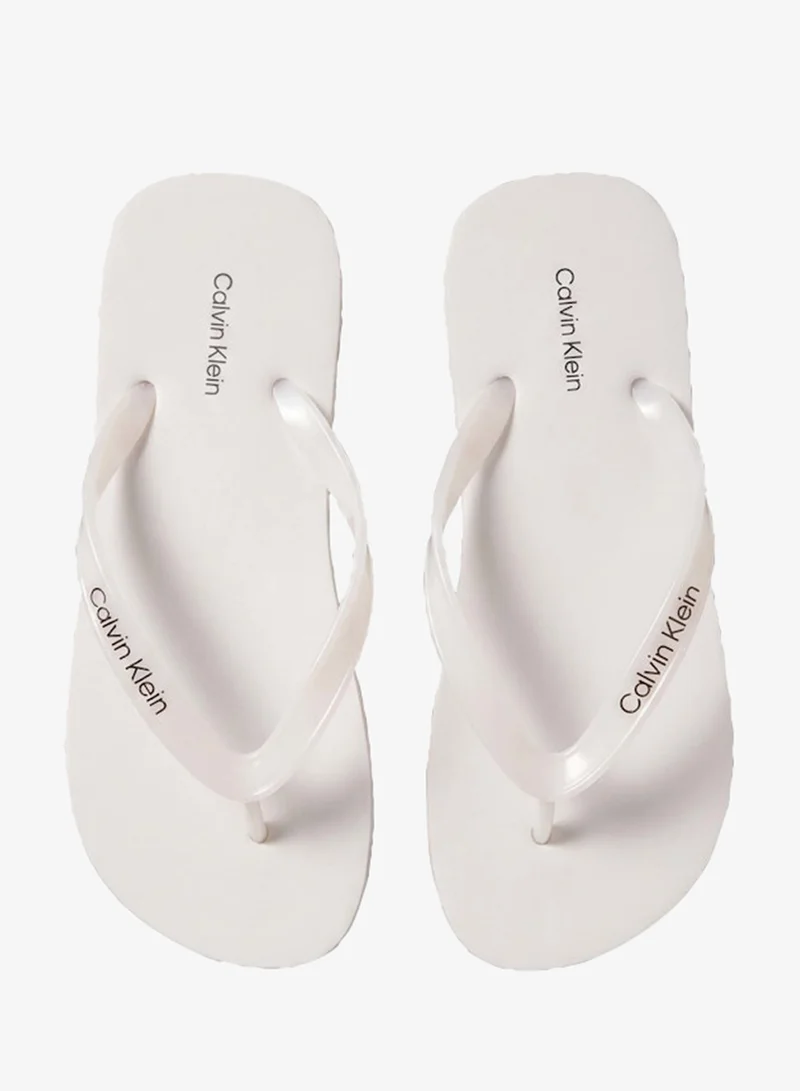 CALVIN KLEIN  Arwa - Metallic Pearlised Flip Flops for Women | Best Price UAE